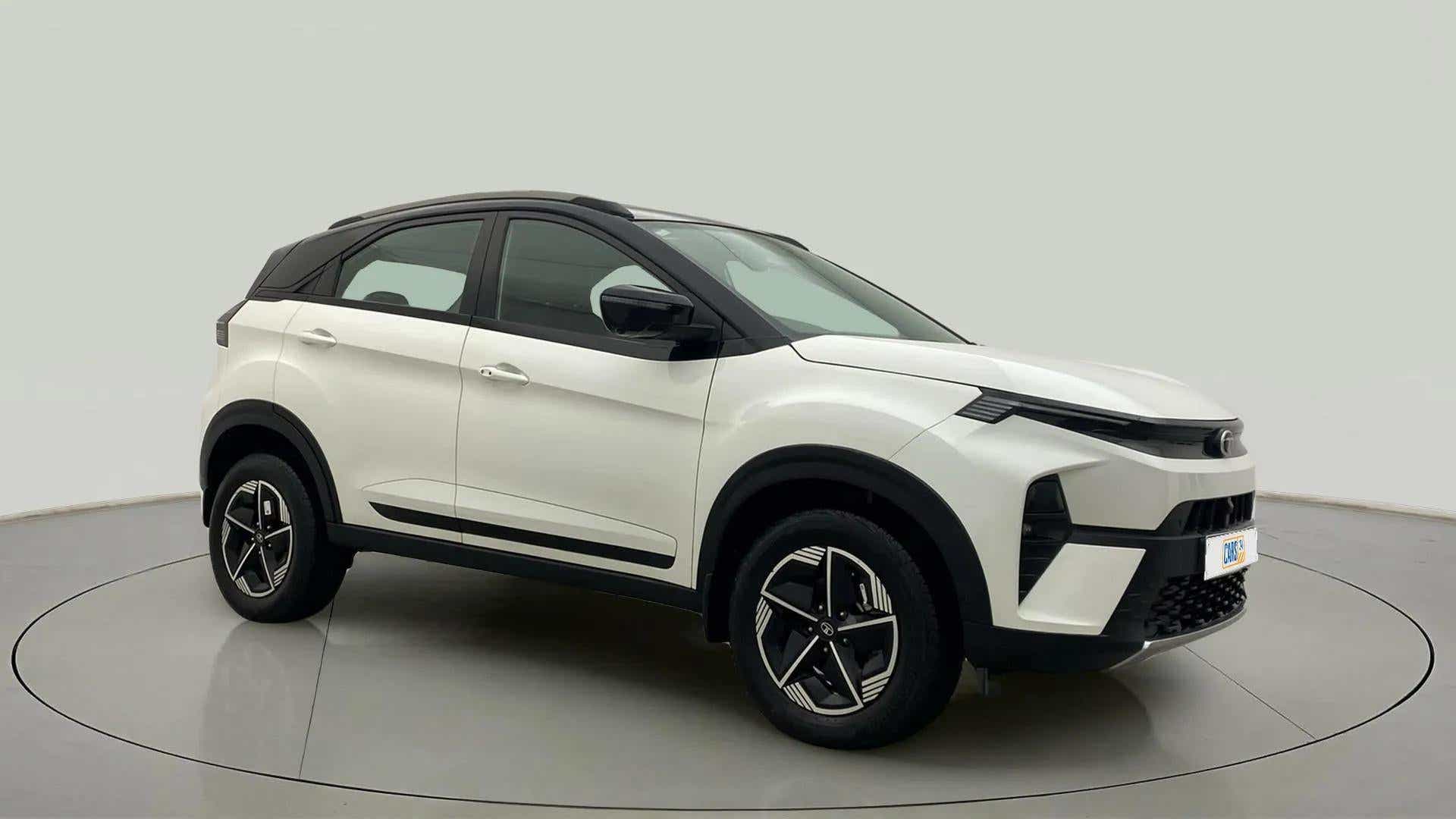 Front three-quarter view of a Tata Nexon