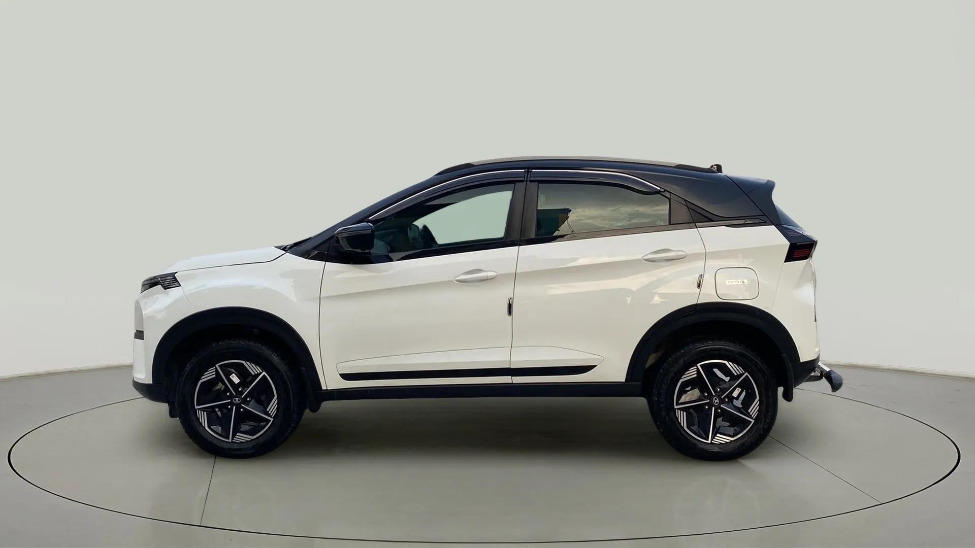 Side view of a Calgary White Tata Nexon 2017-2023