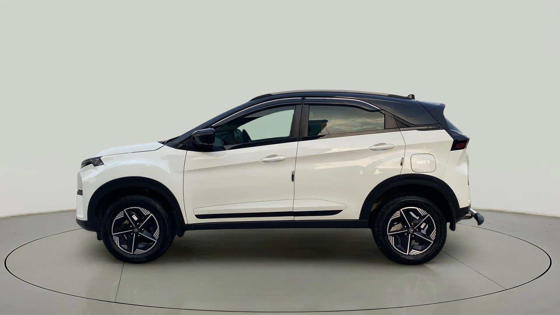 Side view of a Calgary White Tata Nexon 2017-2023