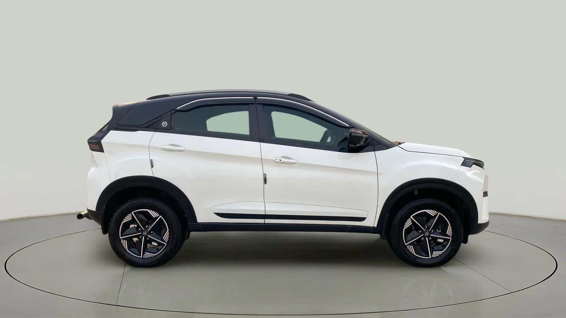 Side view of a Calgary White Tata Nexon 2017-2023