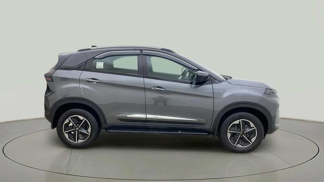 Side view of a daytona grey Tata Nexon