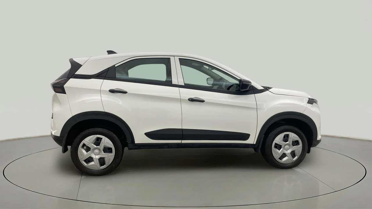 Side view of a Calgary White Tata Nexon