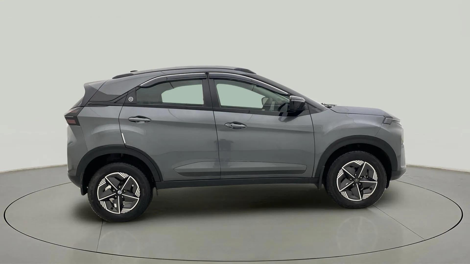 Side view of a Pure Grey Tata Nexon