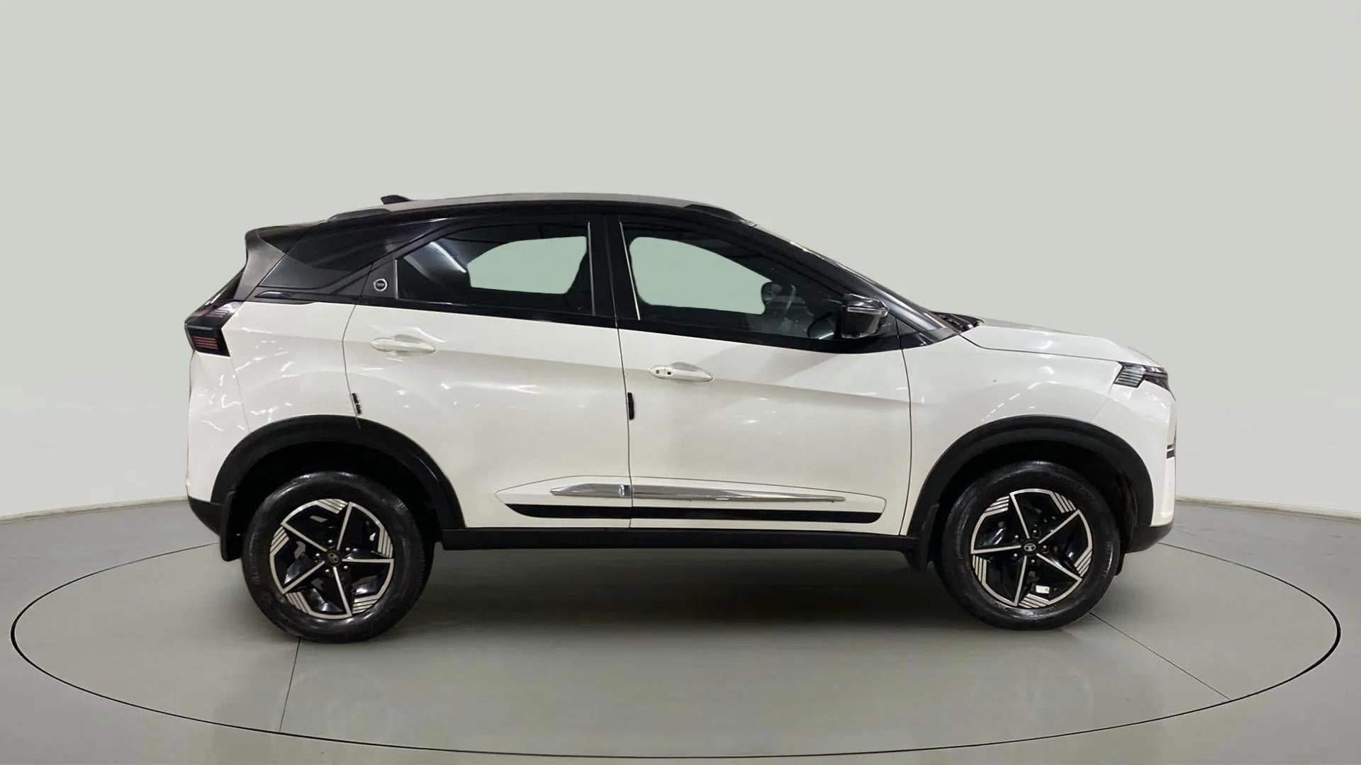Side view of a Calgary White Tata Nexon 2017-2023