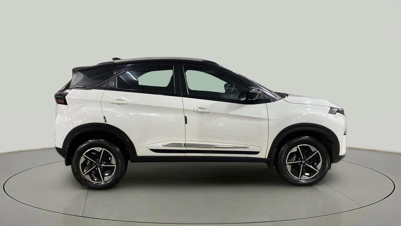 Side view of a Calgary White Tata Nexon 2017-2023