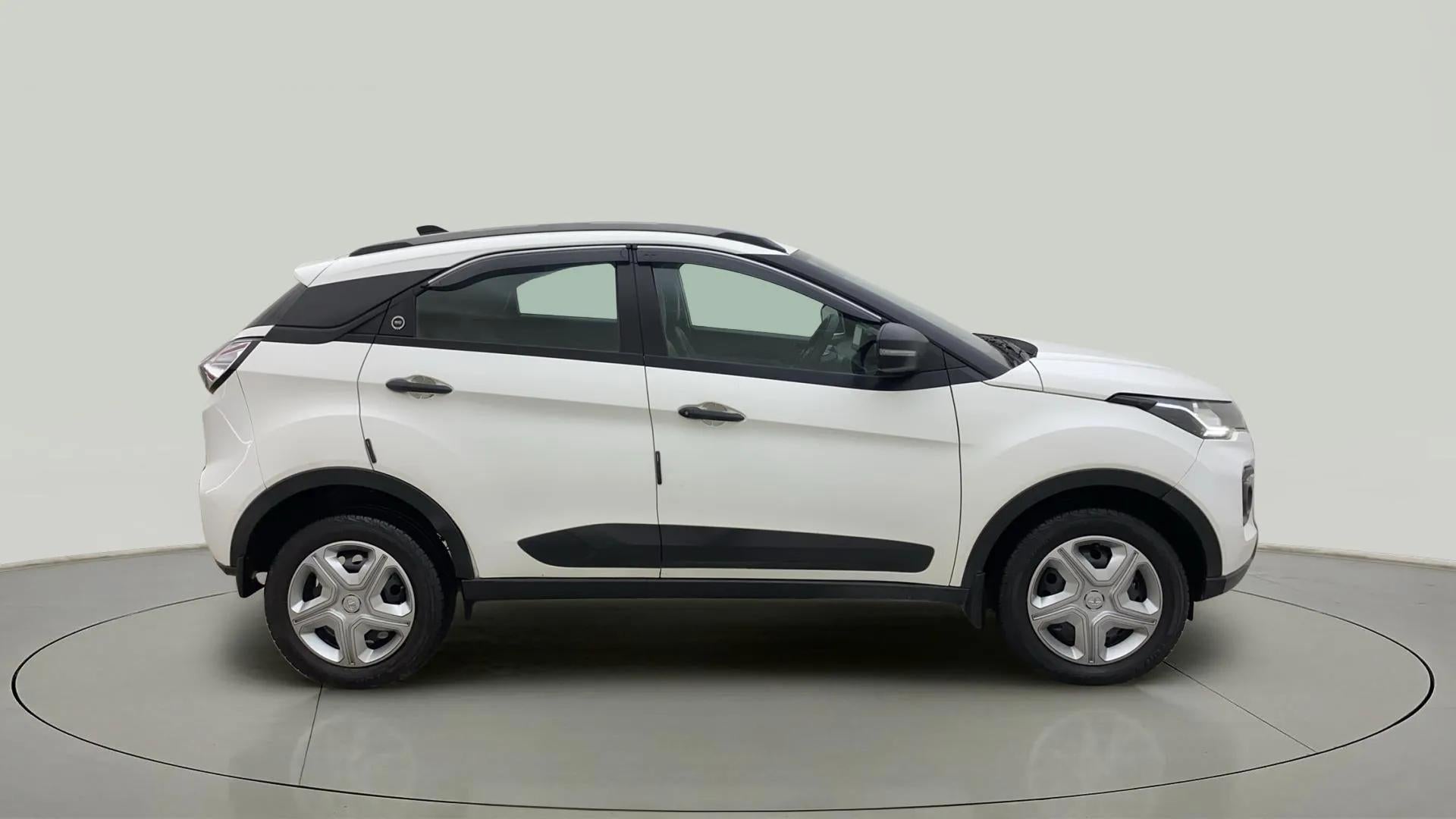 Side view of a calgary white Tata Nexon 2017-2023