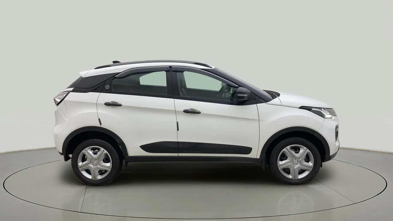 Side view of a calgary white Tata Nexon 2017-2023