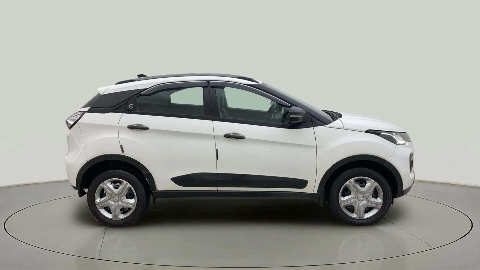 Side view of a calgary white Tata Nexon 2017-2023