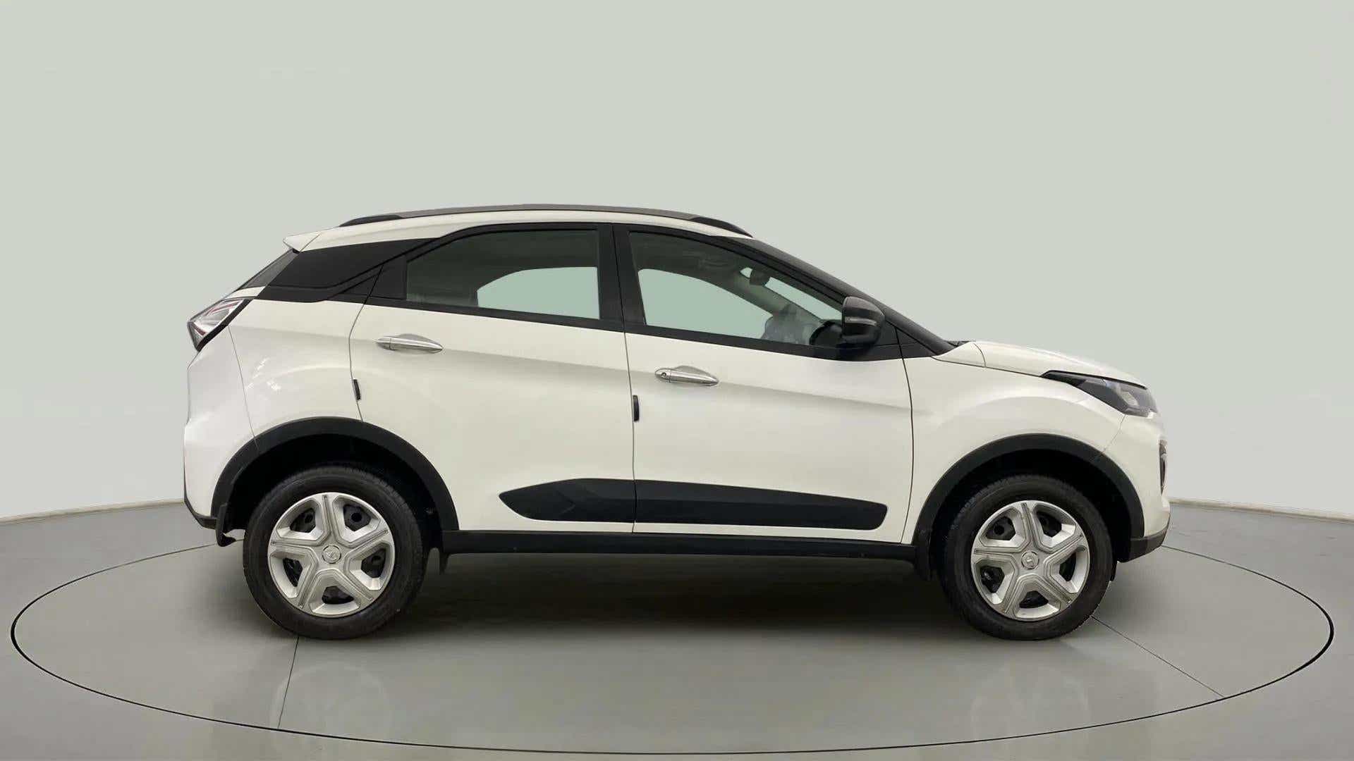 Side view of a Calgary White Tata Nexon 2017-2023
