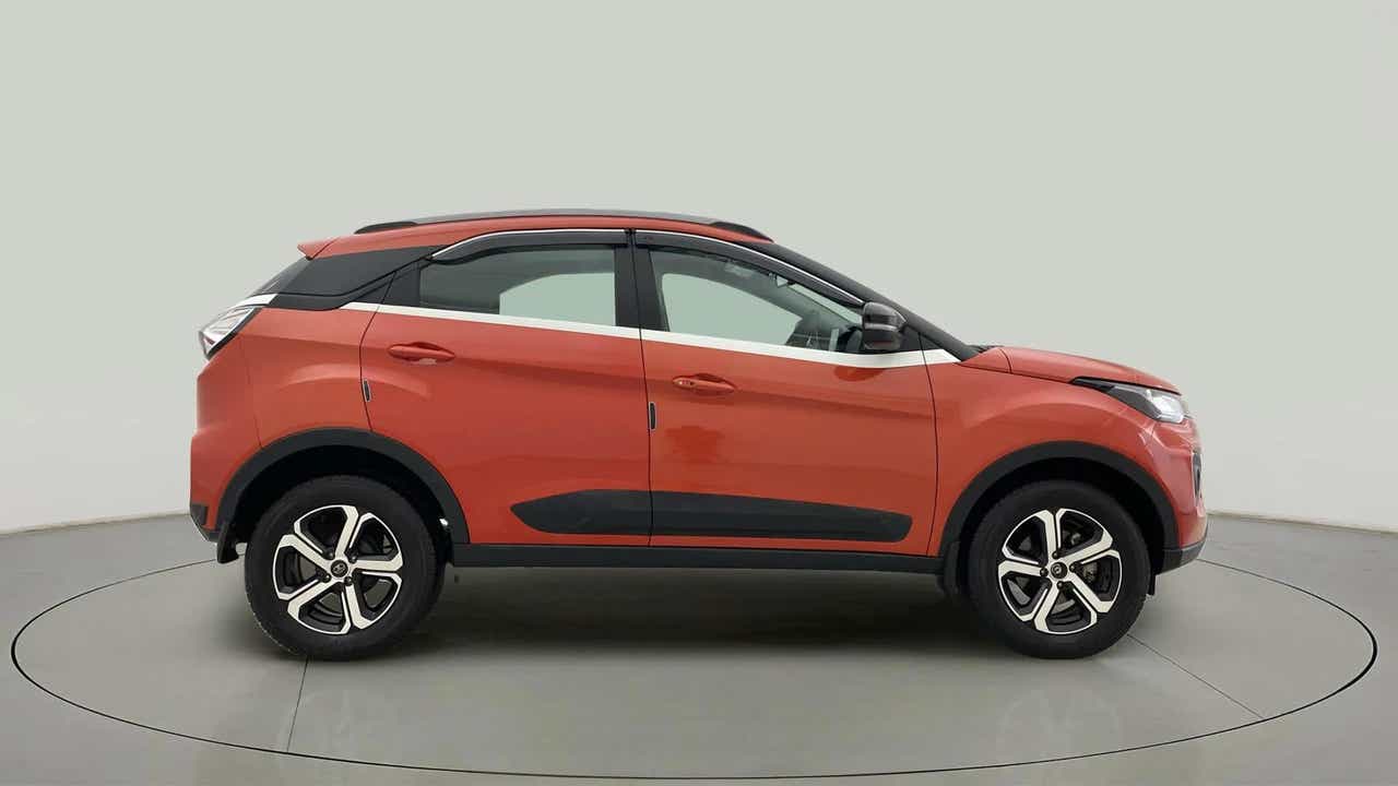 Side view of a Flame Red Tata Nexon 2017-2023