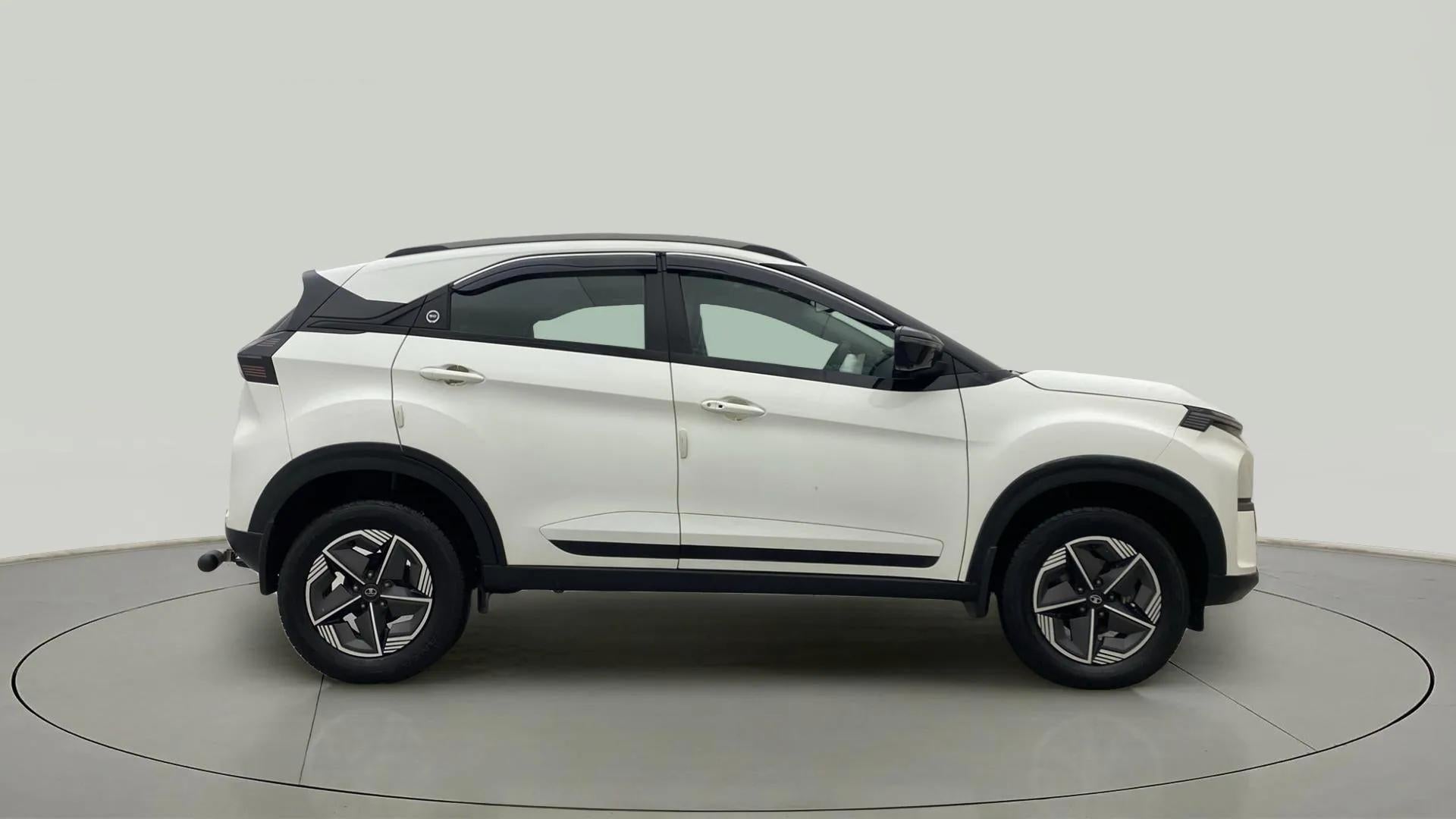 Side view of a Calgary White Tata Nexon 2017-2023