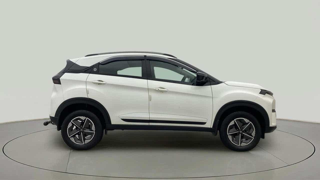 Side view of a Calgary White Tata Nexon 2017-2023