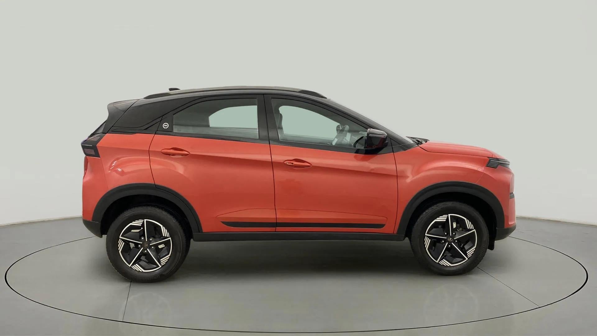 Side view of a Flame Red Tata Nexon 2017-2023