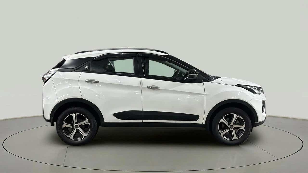 Side view of a Calgary White Tata Nexon 2017-2023