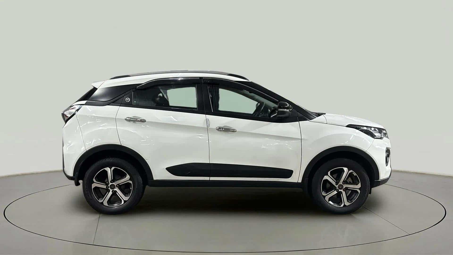 Side view of a Calgary White Tata Nexon 2017-2023