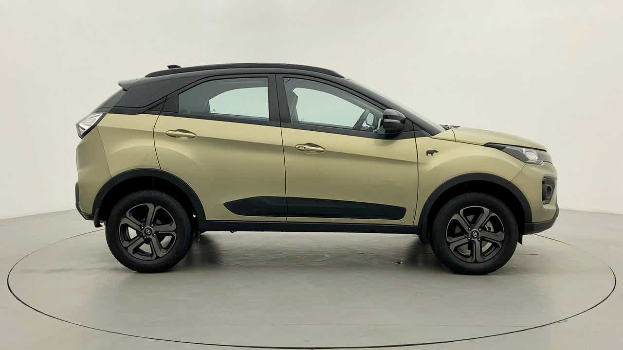Side view of a Grassland Beige Tata Nexon 2017-2023