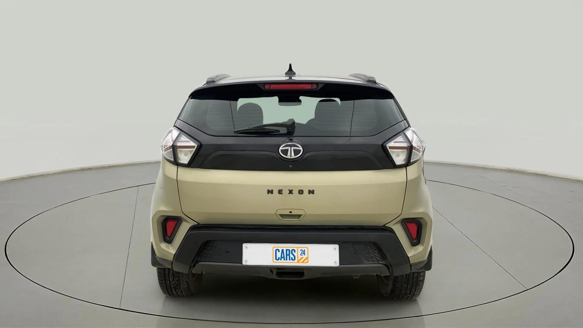 Rear view of a Grassland Beige Tata Nexon 2017-2023