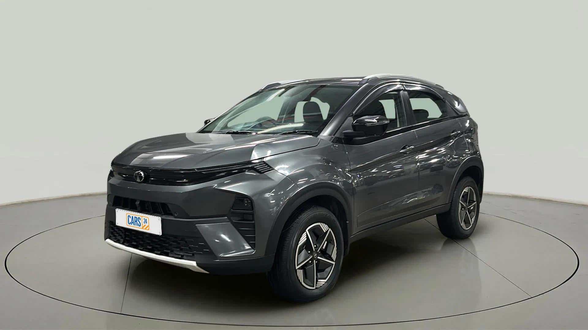 Front three-quarter view of a Daytona Grey Tata Nexon