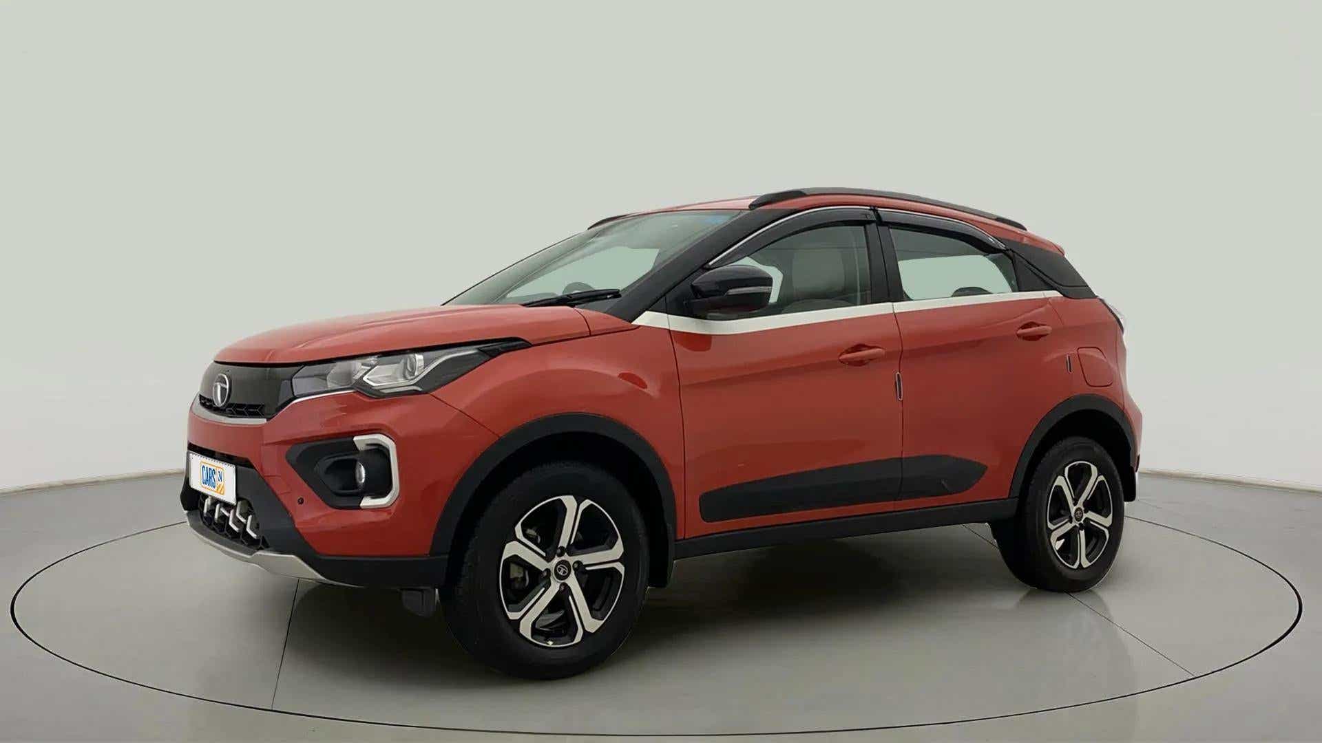 Front three-quarter view of a Flame Red Tata Nexon 2017-2023