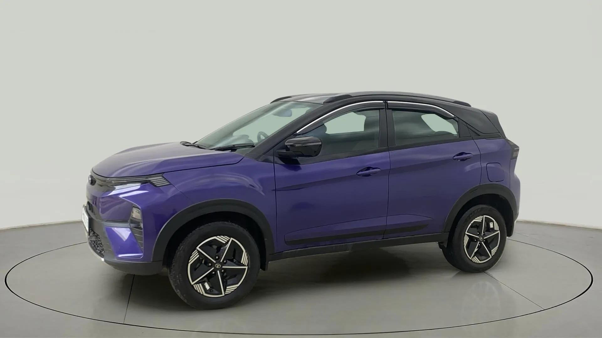 Side view of a Royal Blue Tata Nexon