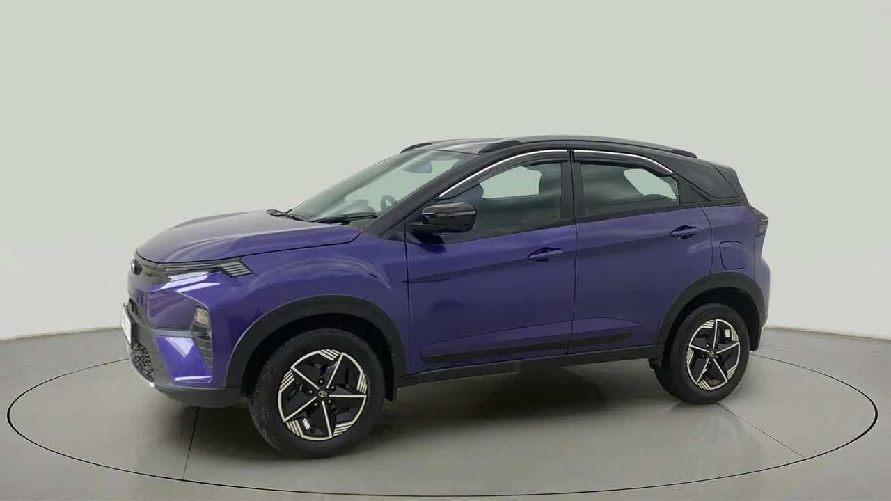 Side view of a Royal Blue Tata Nexon