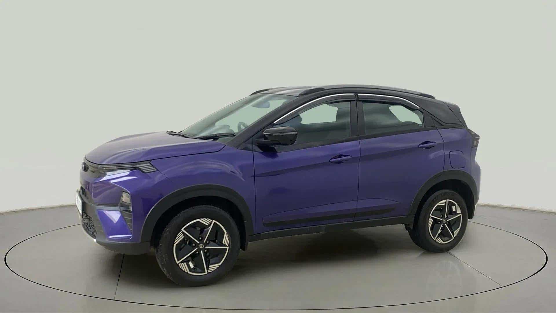 Side view of a Royal Blue Tata Nexon