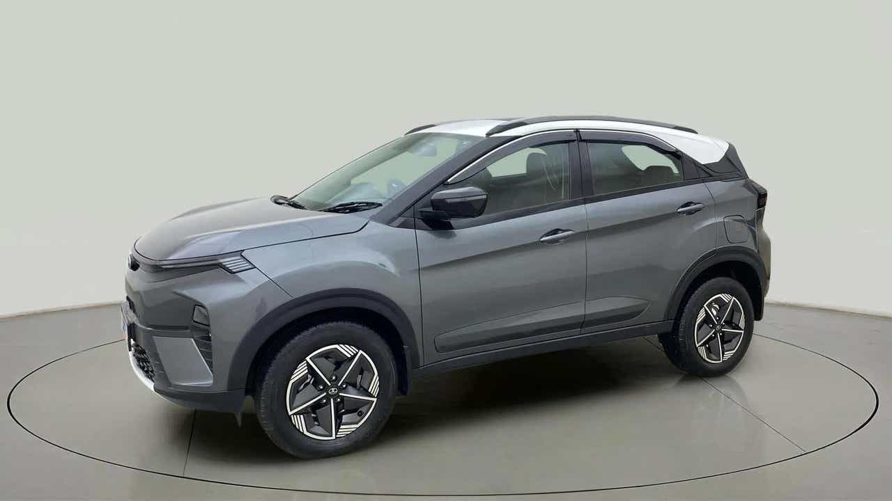 Front side view of a daytona-grey Tata Nexon