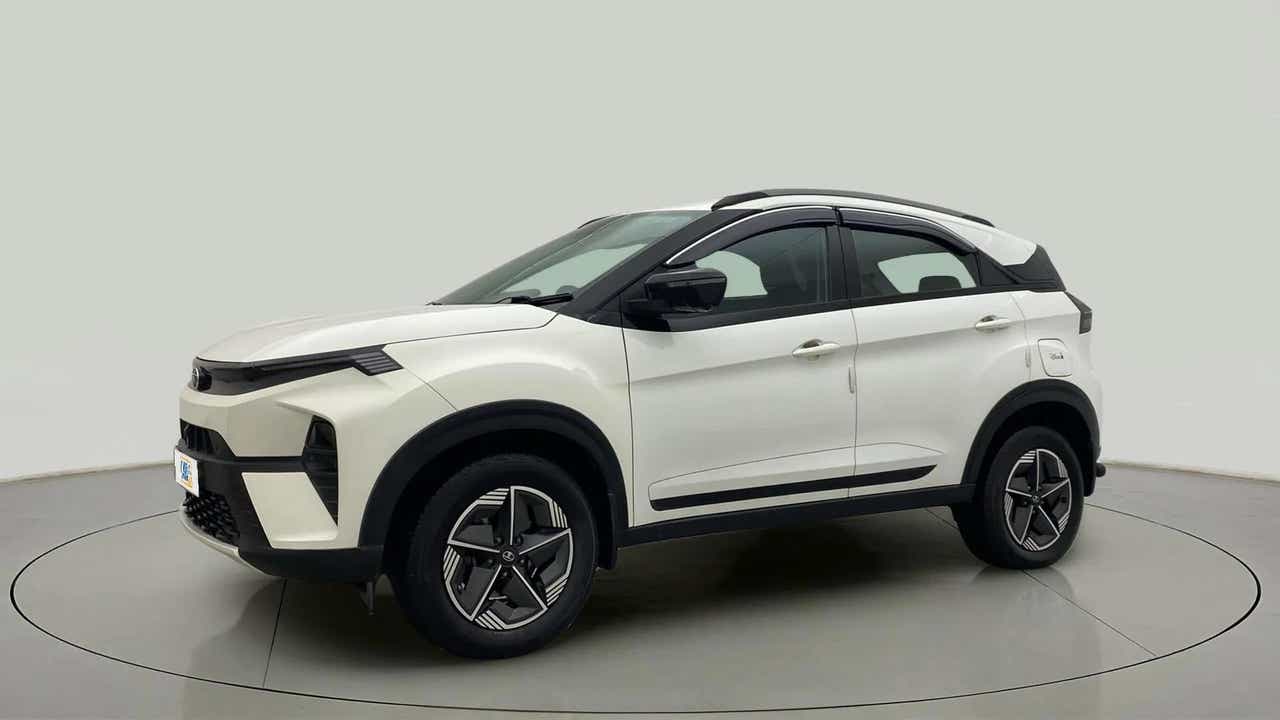 Side view of a Calgary White Tata Nexon 2017-2023