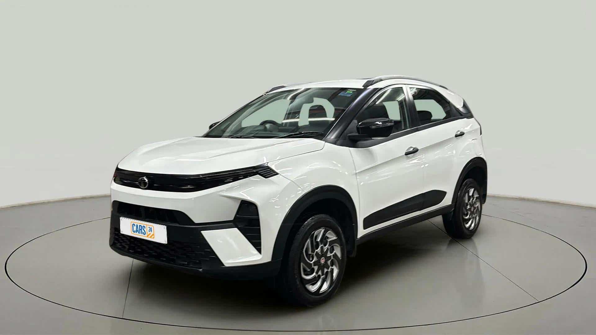 Front three-quarter view of a Tata Nexon