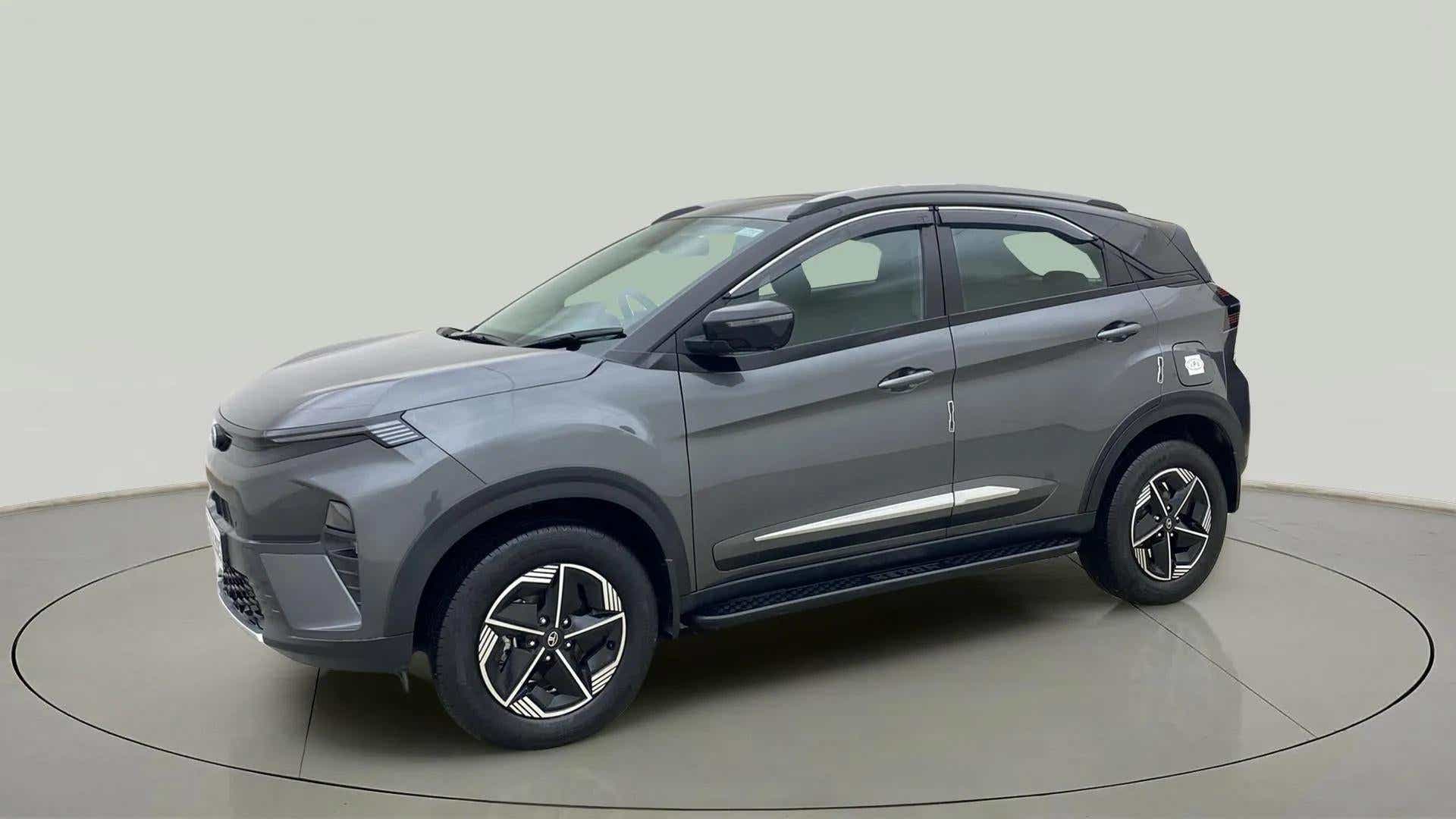 Front three-quarter view of a Daytona Grey Tata Nexon