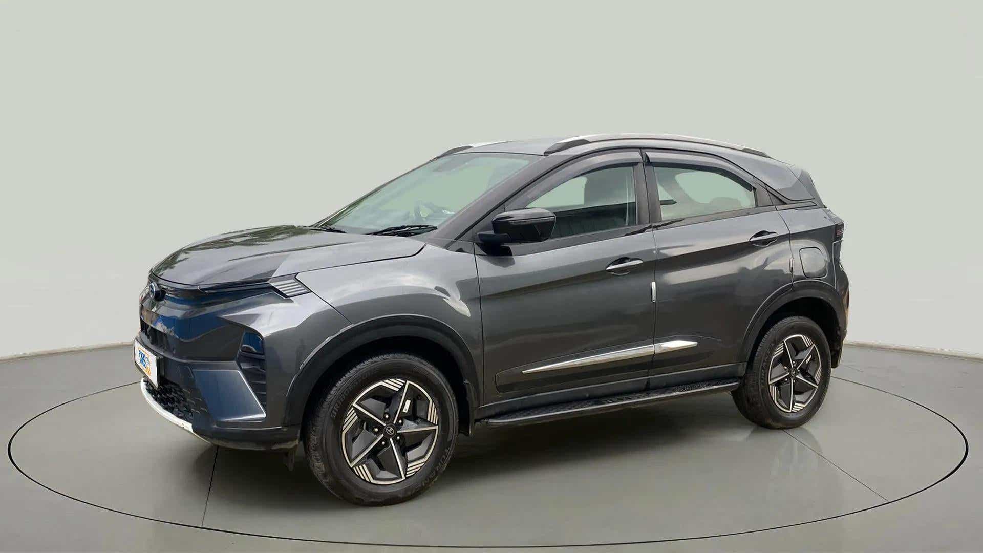 Front three-quarter view of a Tata Nexon