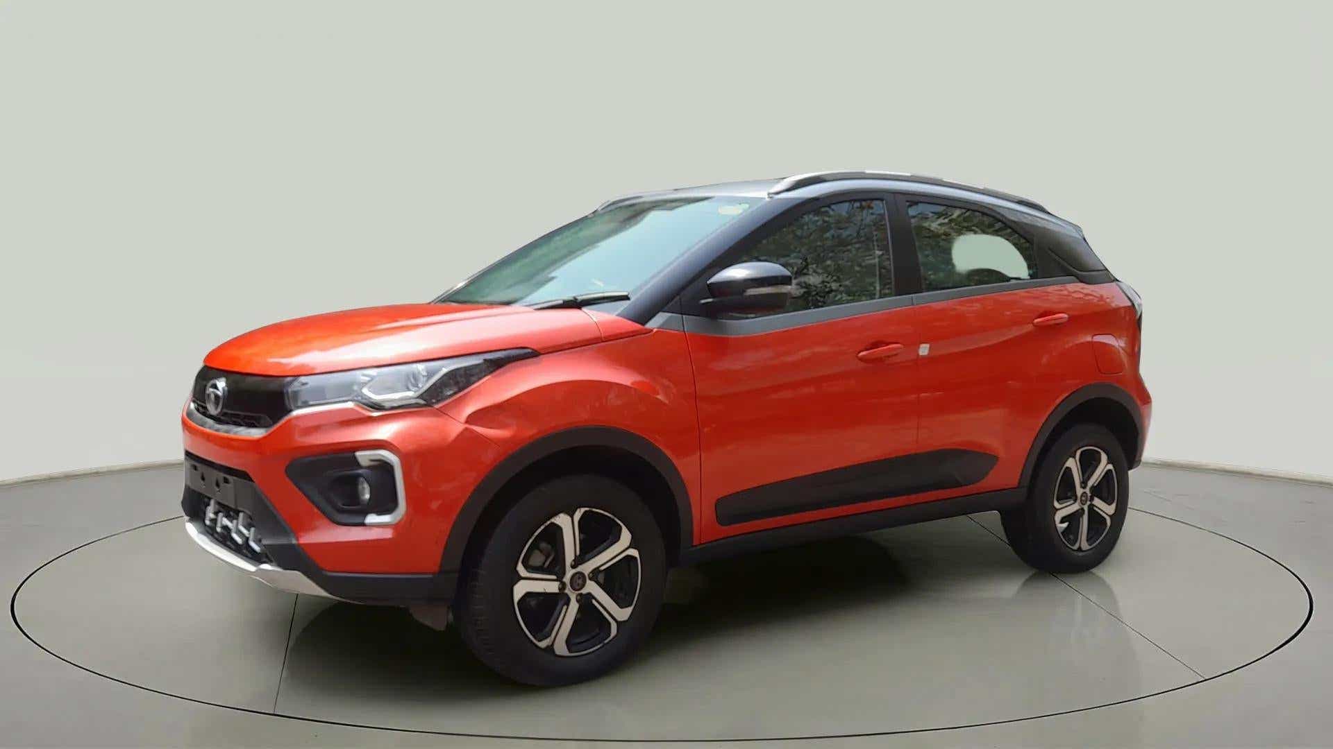 Front three-quarter view of a Flame Red Tata Nexon 2017-2023