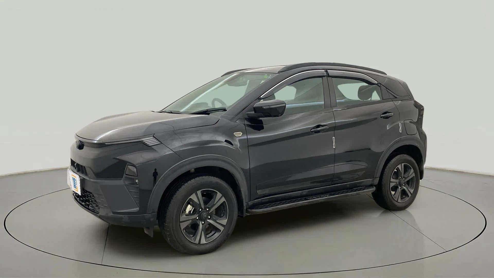 Front three-quarter view of a Tata Nexon