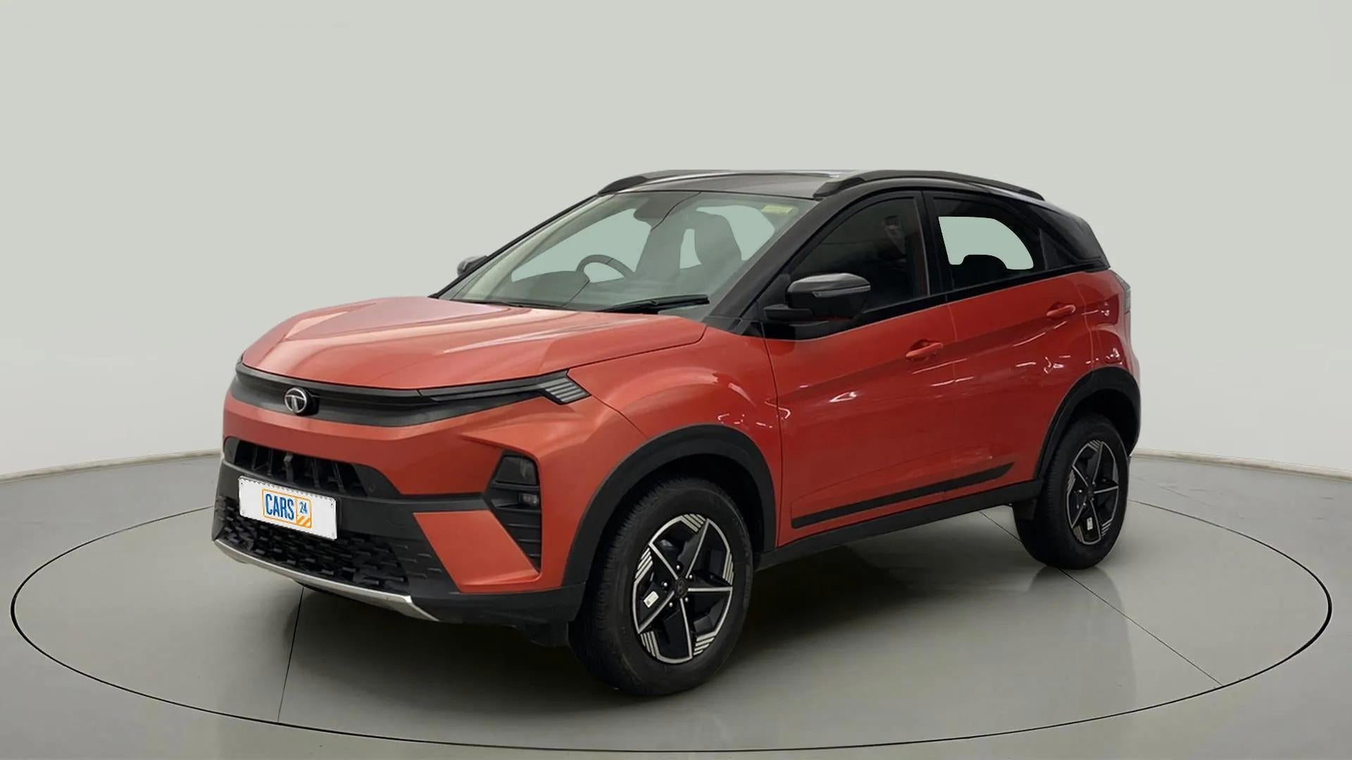 Front three-quarter view of a Flame Red Tata Nexon 2017-2023