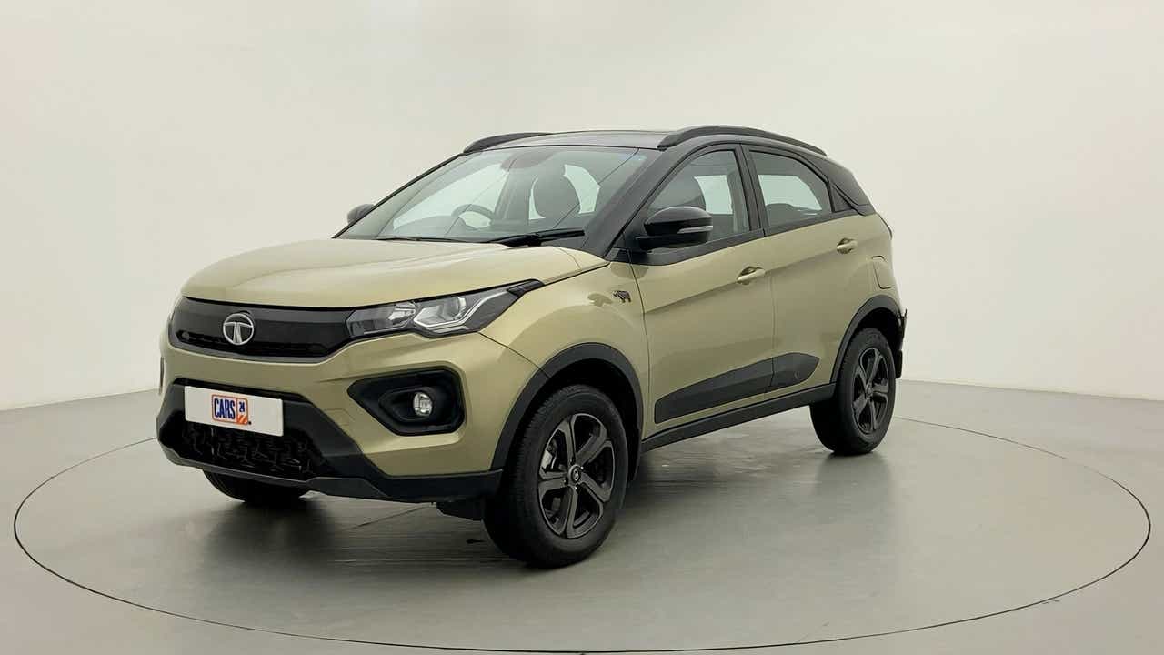 Front three-quarter view of a Grassland Beige Tata Nexon 2017-2023