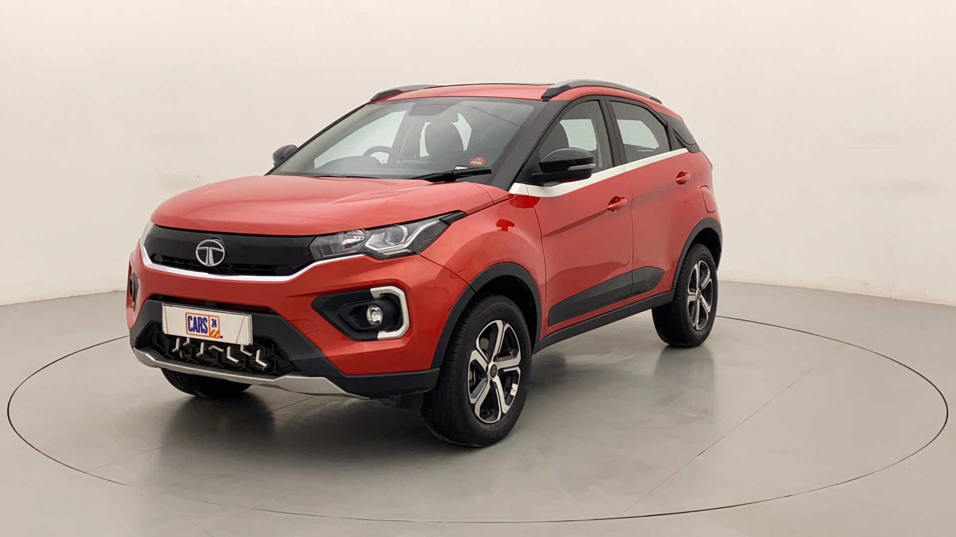 Front three-quarter of a Flame Red Tata Nexon 2017-2023