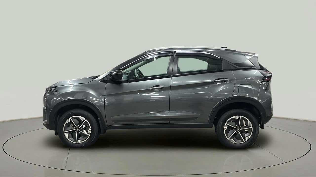 Side view of a daytona grey Tata Nexon