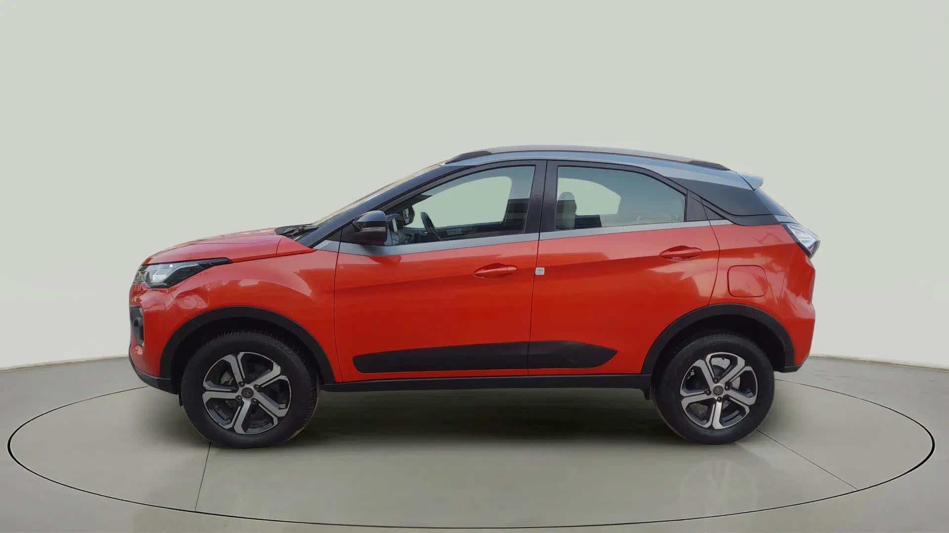 Side view of a Flame Red Tata Nexon 2017-2023