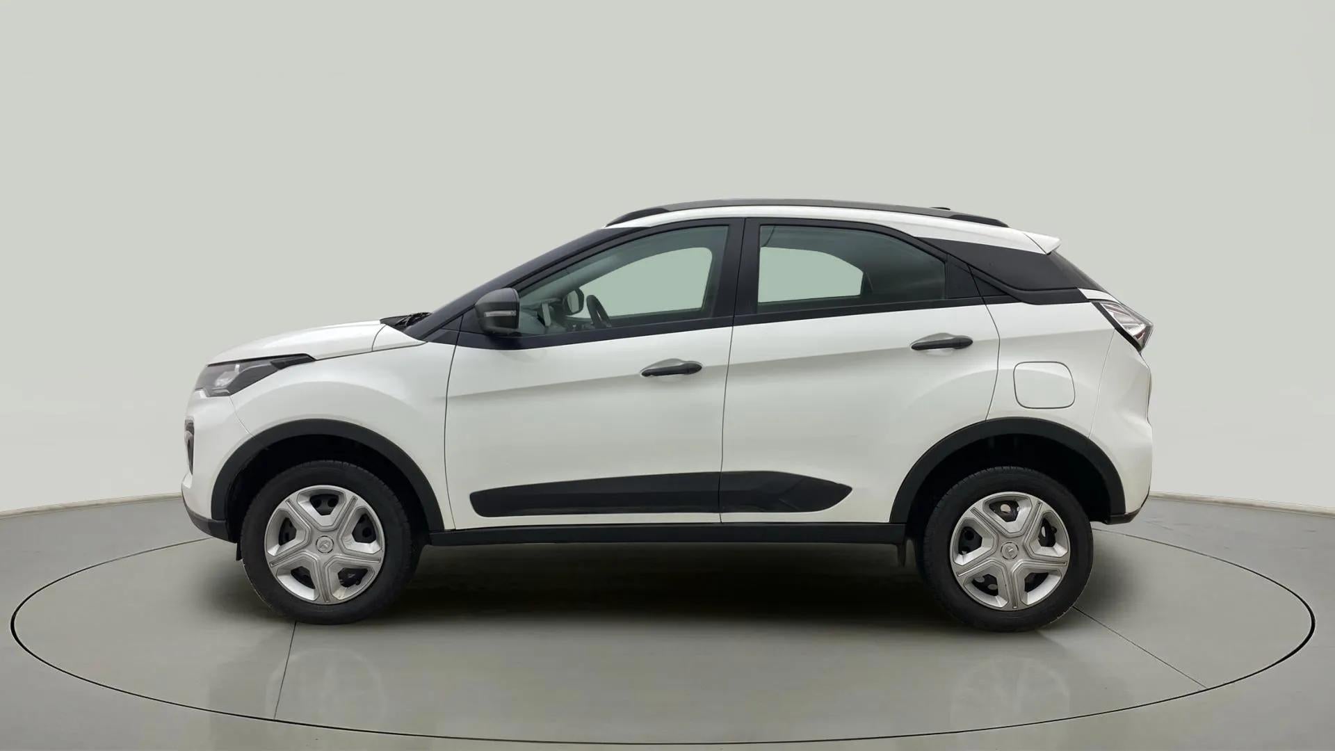 Side view of a Calgary White Tata Nexon 2017-2023