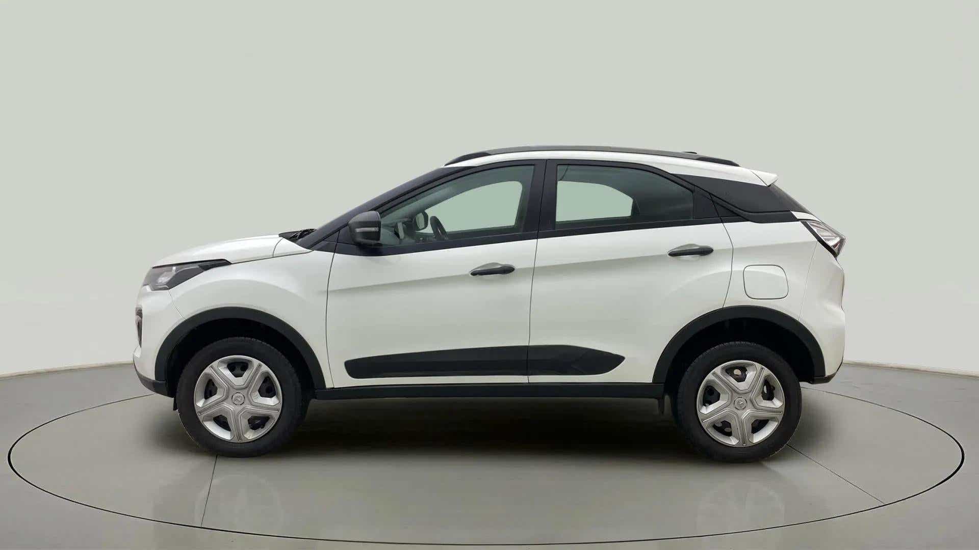 Side view of a Calgary White Tata Nexon 2017-2023