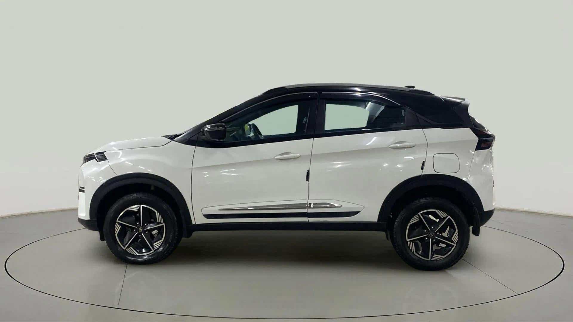 Side view of a Calgary White Tata Nexon 2017-2023