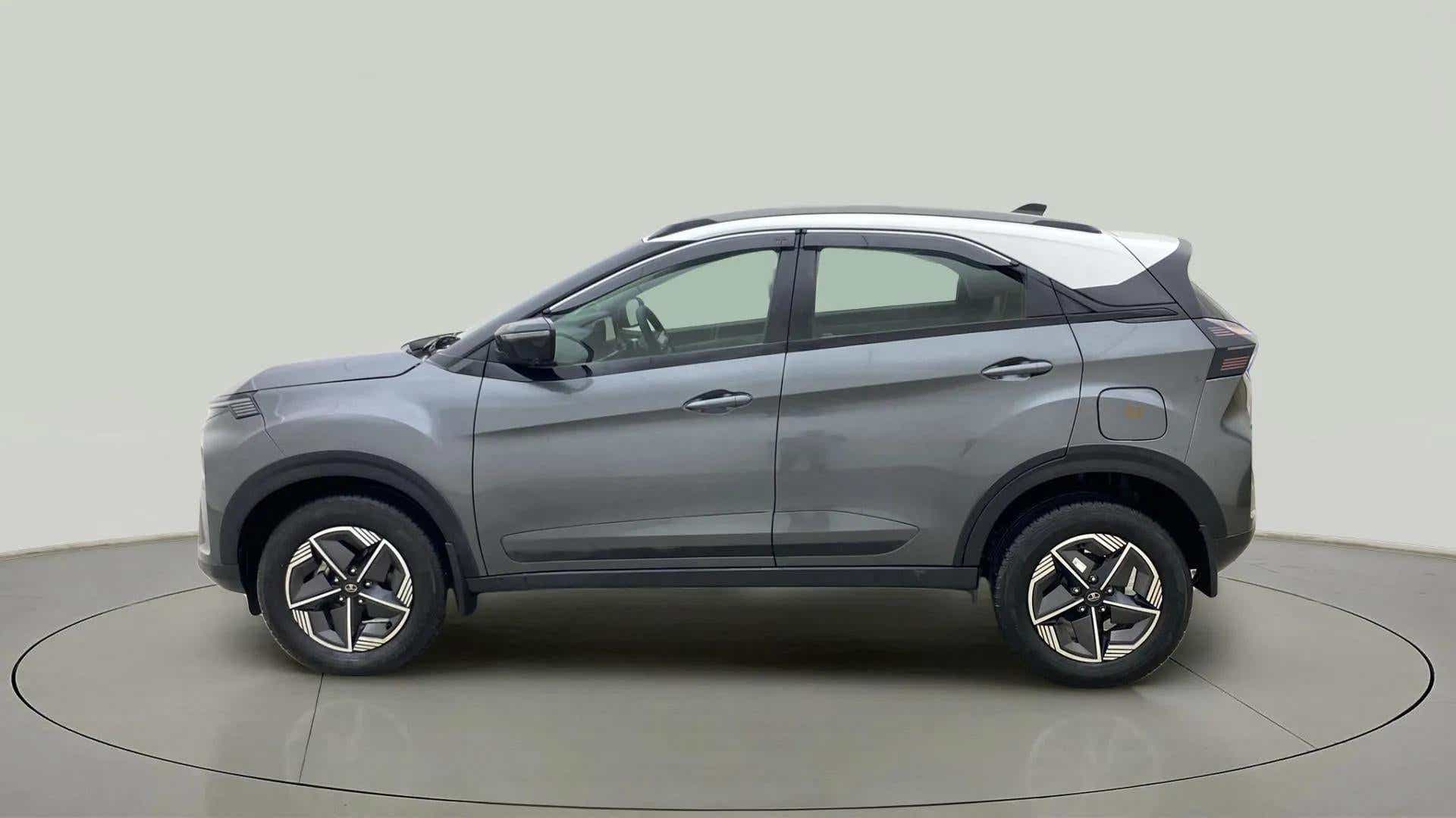 Side view of a pure grey Tata Nexon
