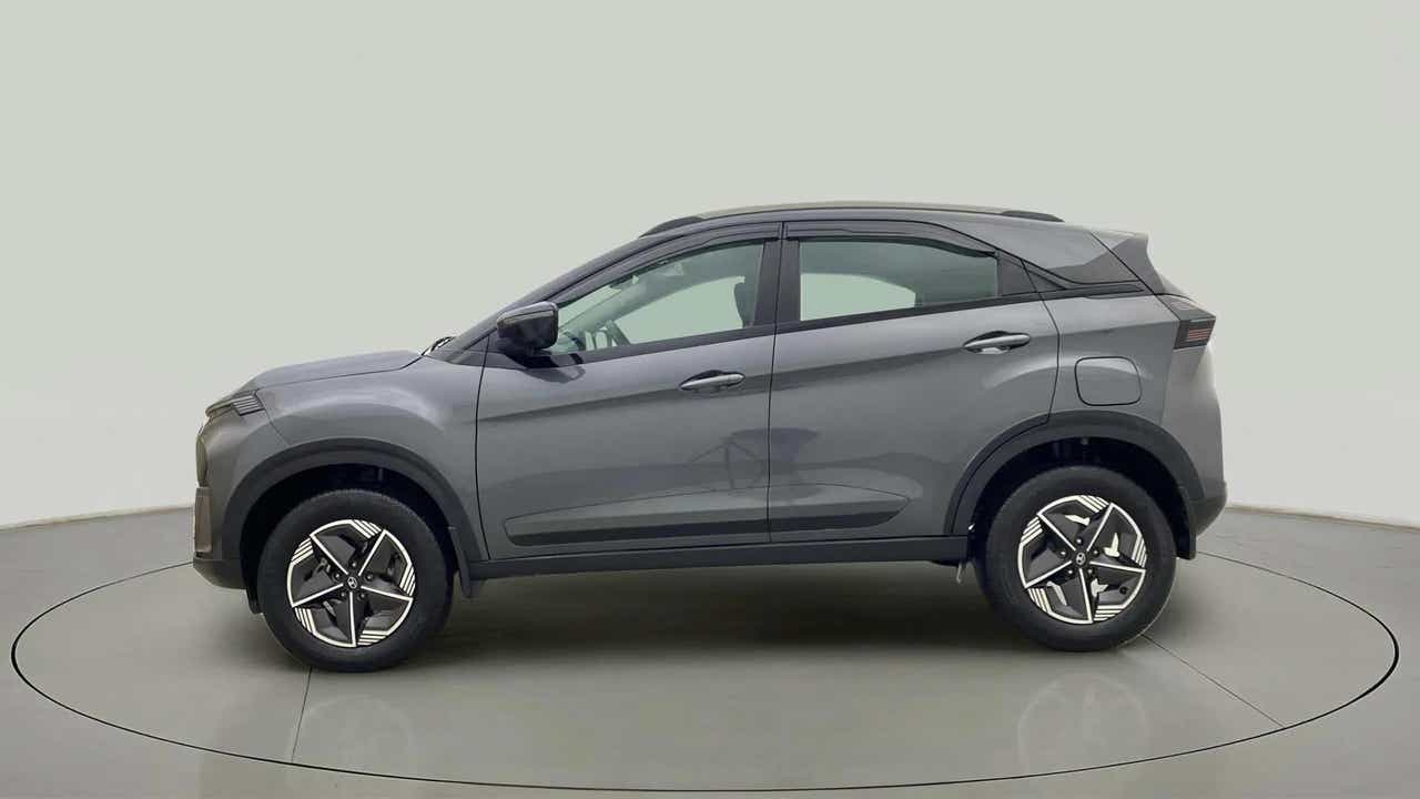 Side view of a daytona grey Tata Nexon