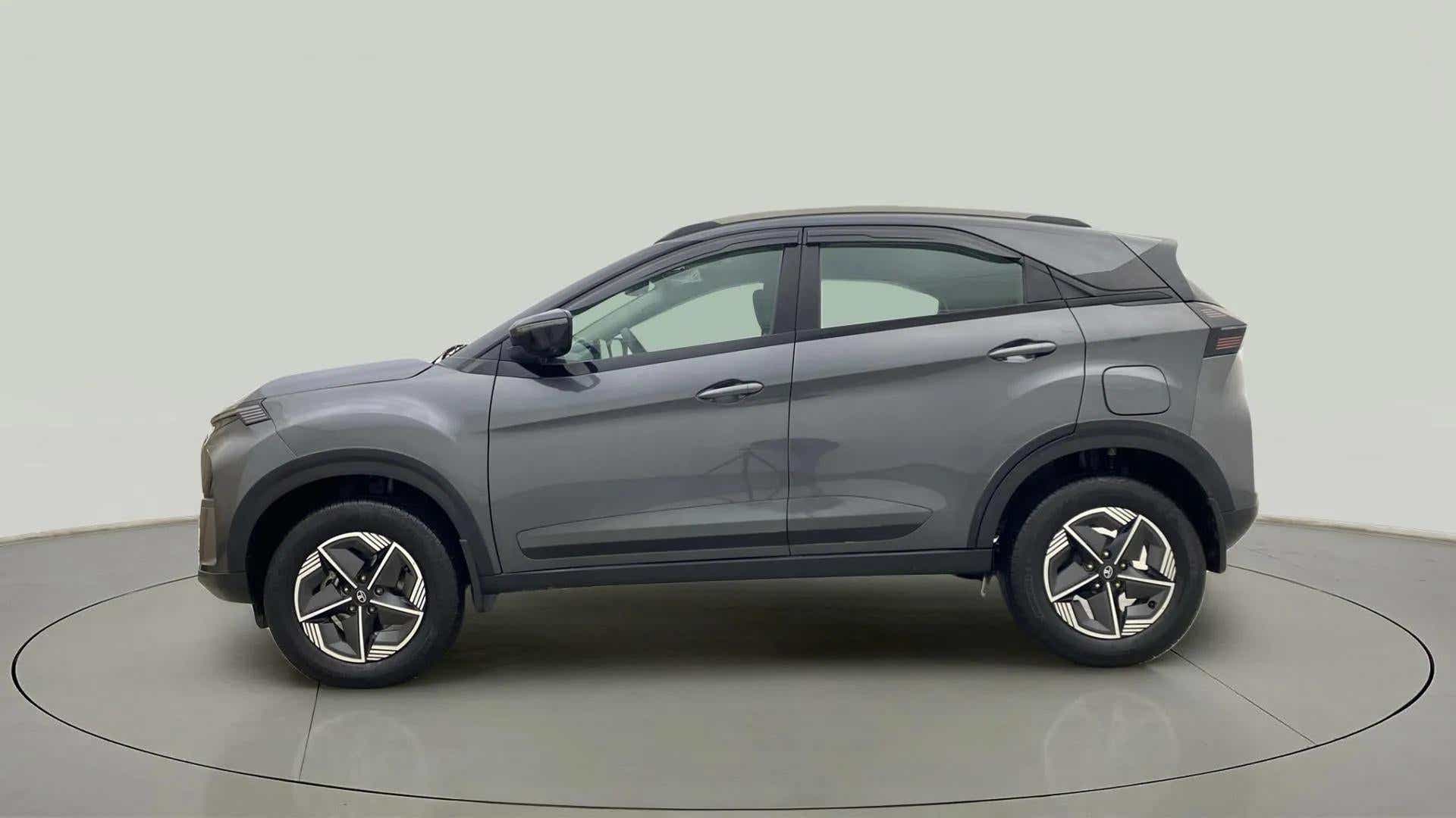 Side view of a daytona grey Tata Nexon