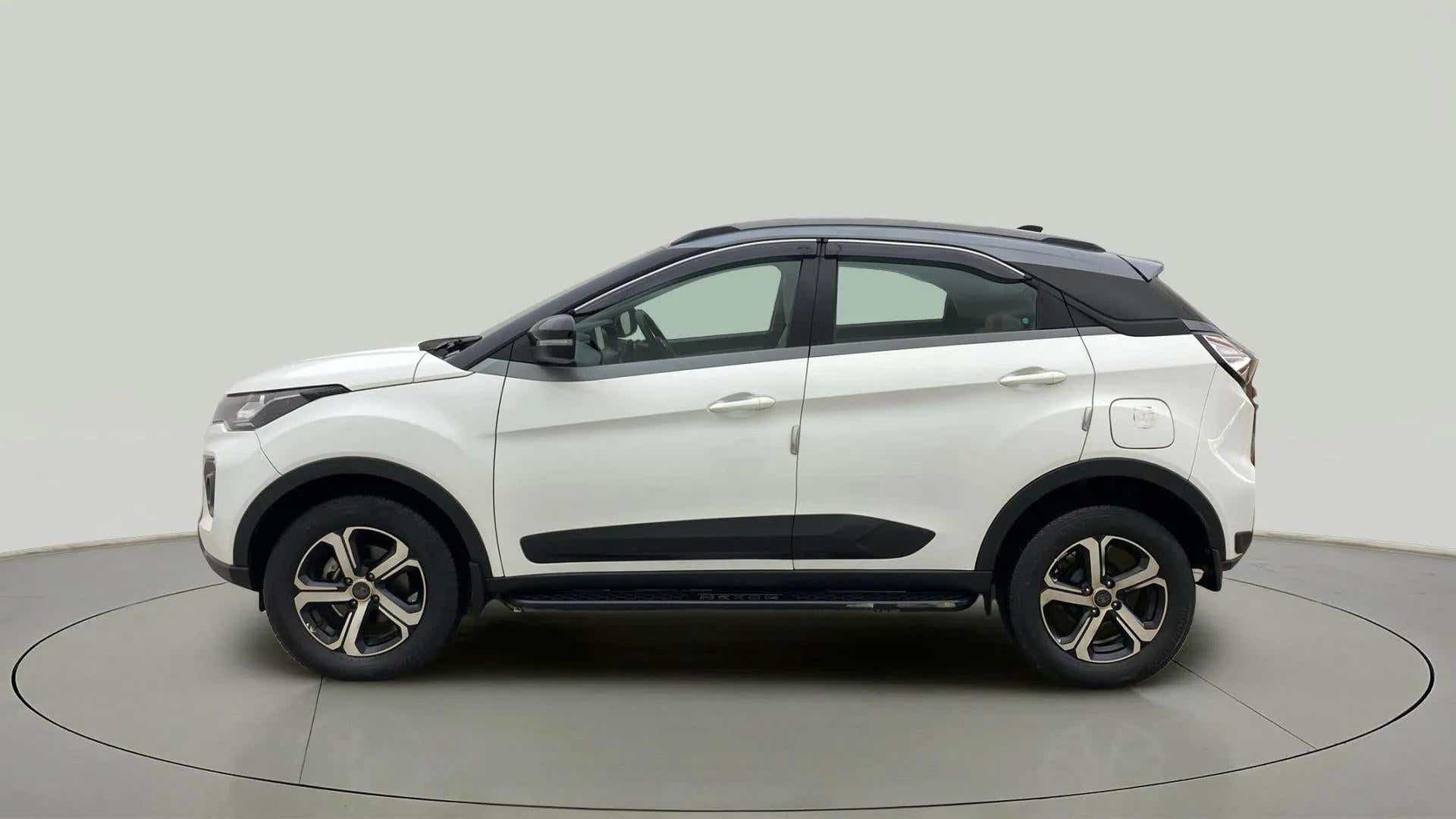 Side view of a calgary white Tata Nexon 2017-2023