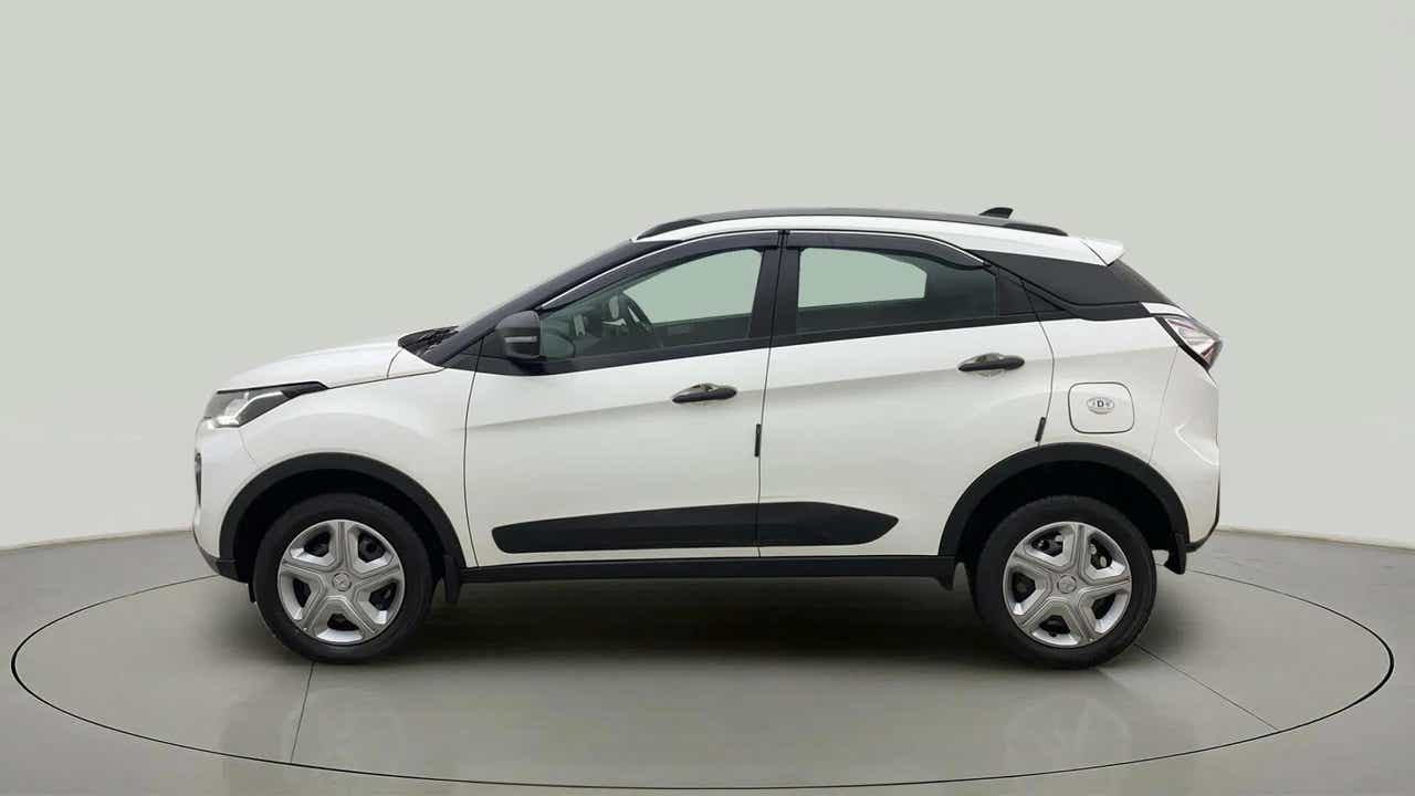 Side view of a calgary-white Tata Nexon 2017-2023