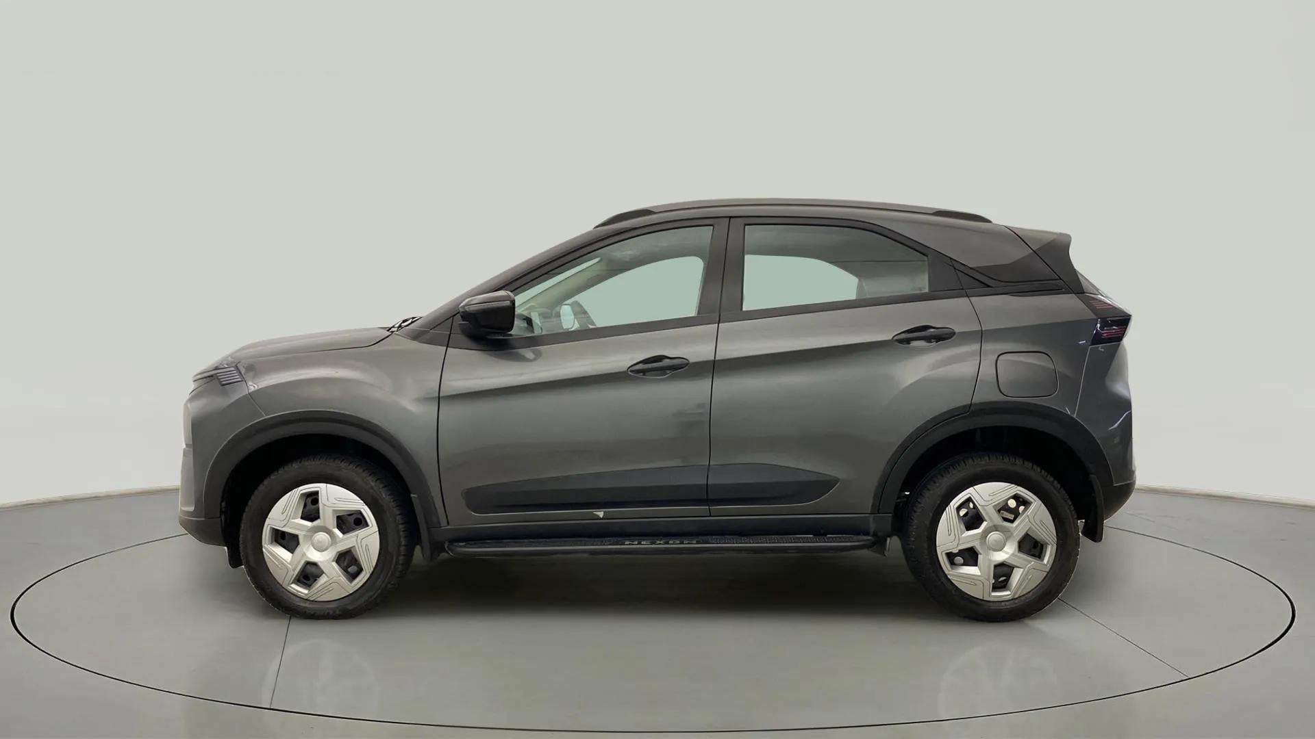 Side view of a daytona grey Tata Nexon