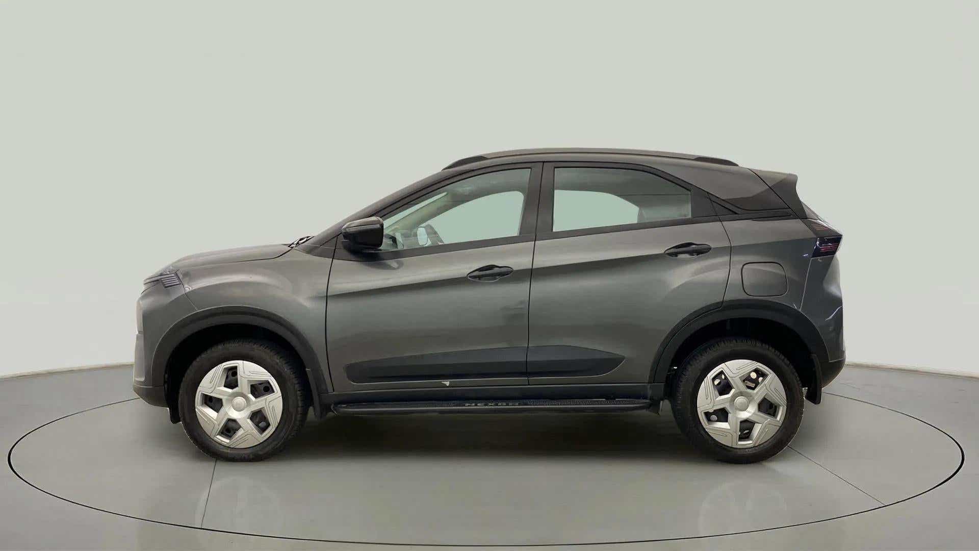 Side view of a daytona grey Tata Nexon