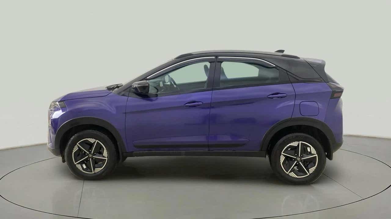 Side view of a Royal Blue Tata Nexon