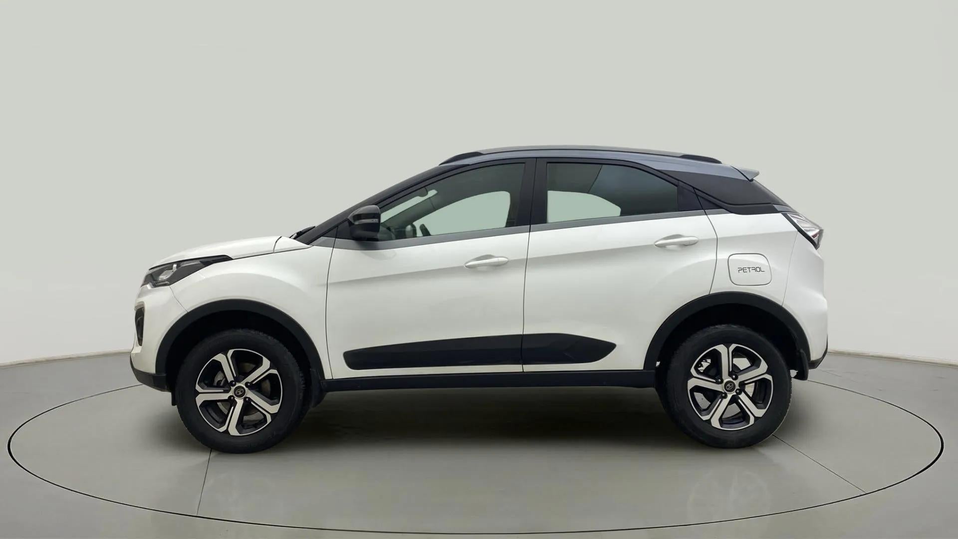 Side view of a Calgary White Tata Nexon 2017-2023